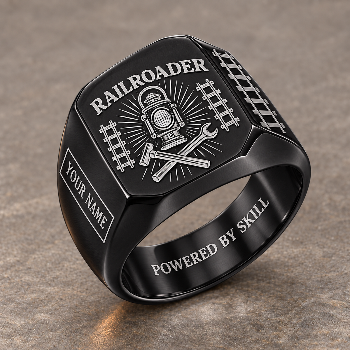 Black Railroader Sunburst Legacy ring with railway lantern, crossed track tools and sunburst artwork and illustrative YOUR NAME and POWERED BY SKILL