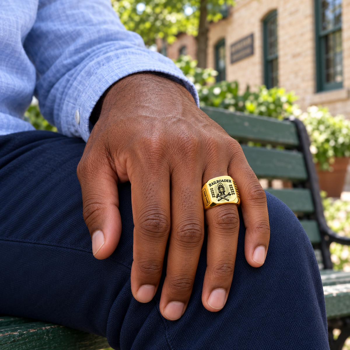 Gold Railroader Sunburst Legacy ring worn in a safe off-duty setting
