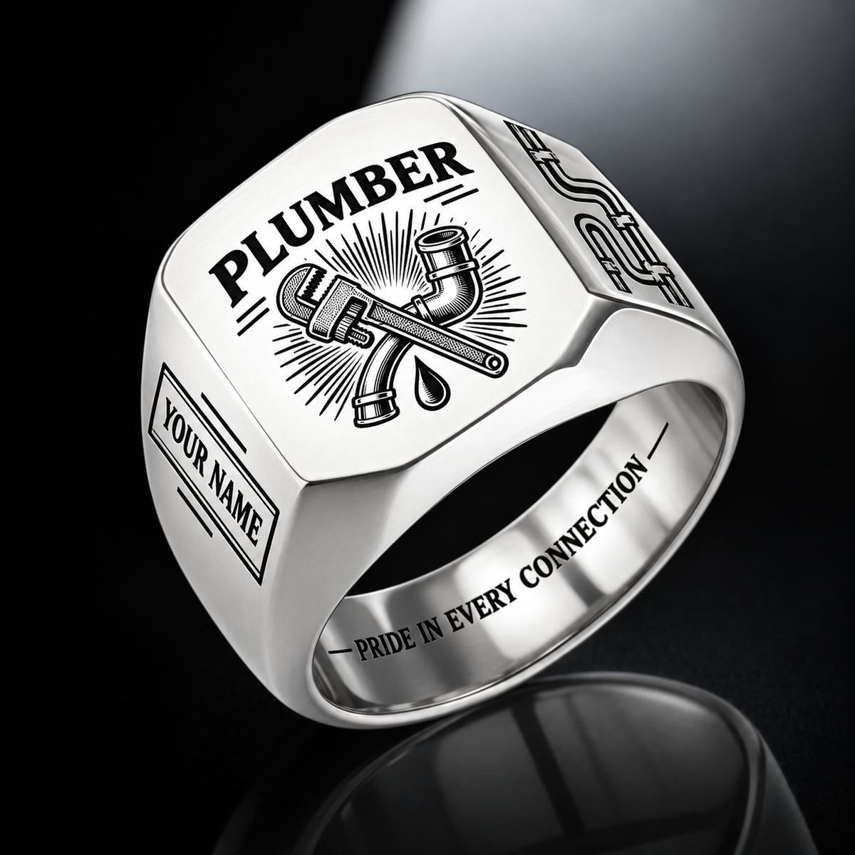 Personalized plumber engraved signet ring with sunburst legacy occupational artwork.