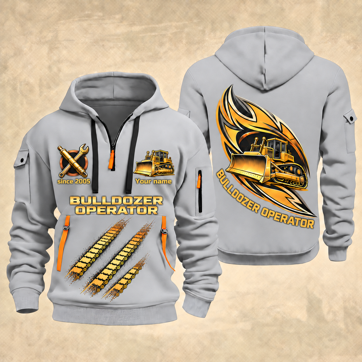 Bulldozer Operator Flow of Craft Quarter-Zip Hoodie in Light Grey, front and back views with tracked bulldozer and broad front blade, sweeping gold and cream emblem, three diagonal track prints, and Your name and since 2005 sample text