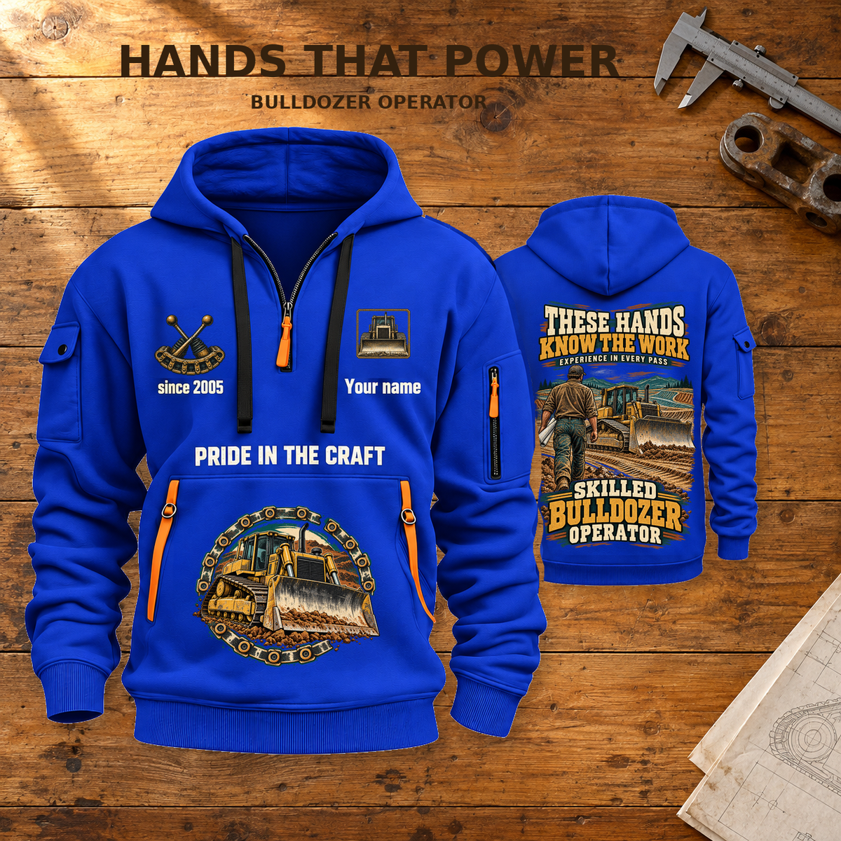 Bulldozer Operator Hands That Power Quarter-Zip Hoodie in Blue, dominant front and smaller back view on a warm workbench