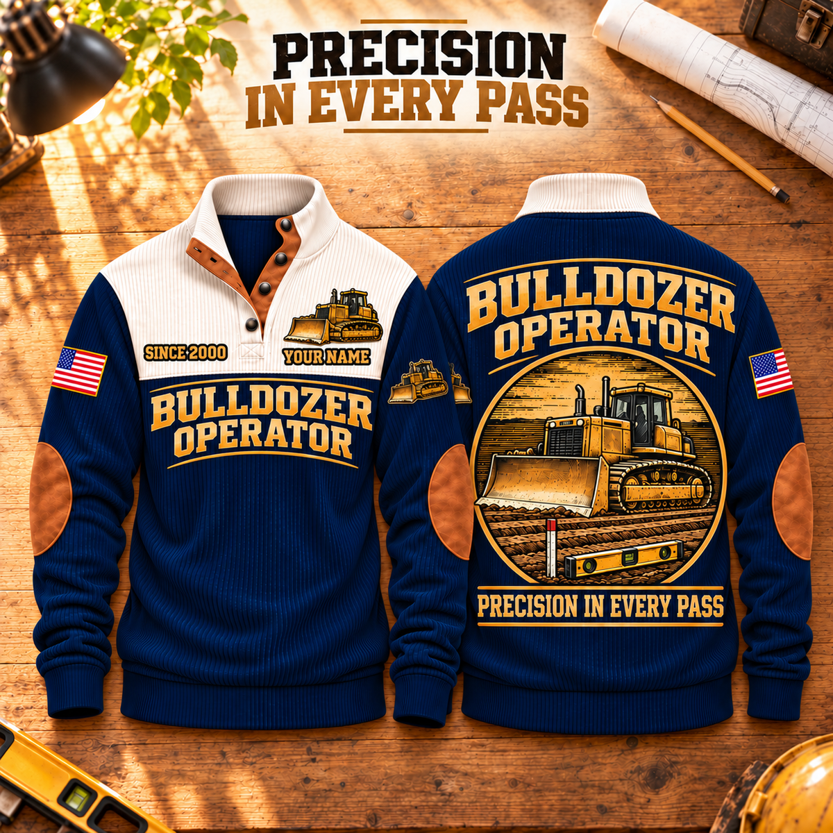 Bulldozer Operator Precision Grade Sports Sweatshirt in Navy, front and back with broad-blade tracked dozer, grade stake, spirit level and Precision in Every Pass lettering, on a warm wooden worktable