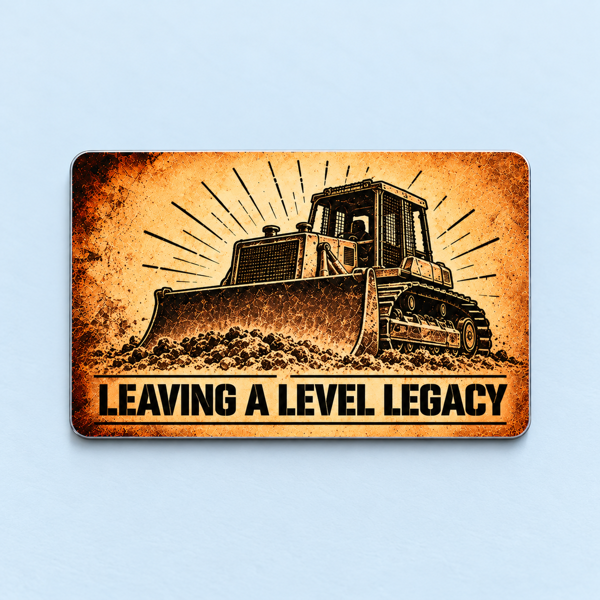Reverse of the Bulldozer Operator Sepia Legacy aluminum wallet card, with a tracked bulldozer, broad front blade and LEAVING A LEVEL LEGACY lettering on a distressed sepia print.