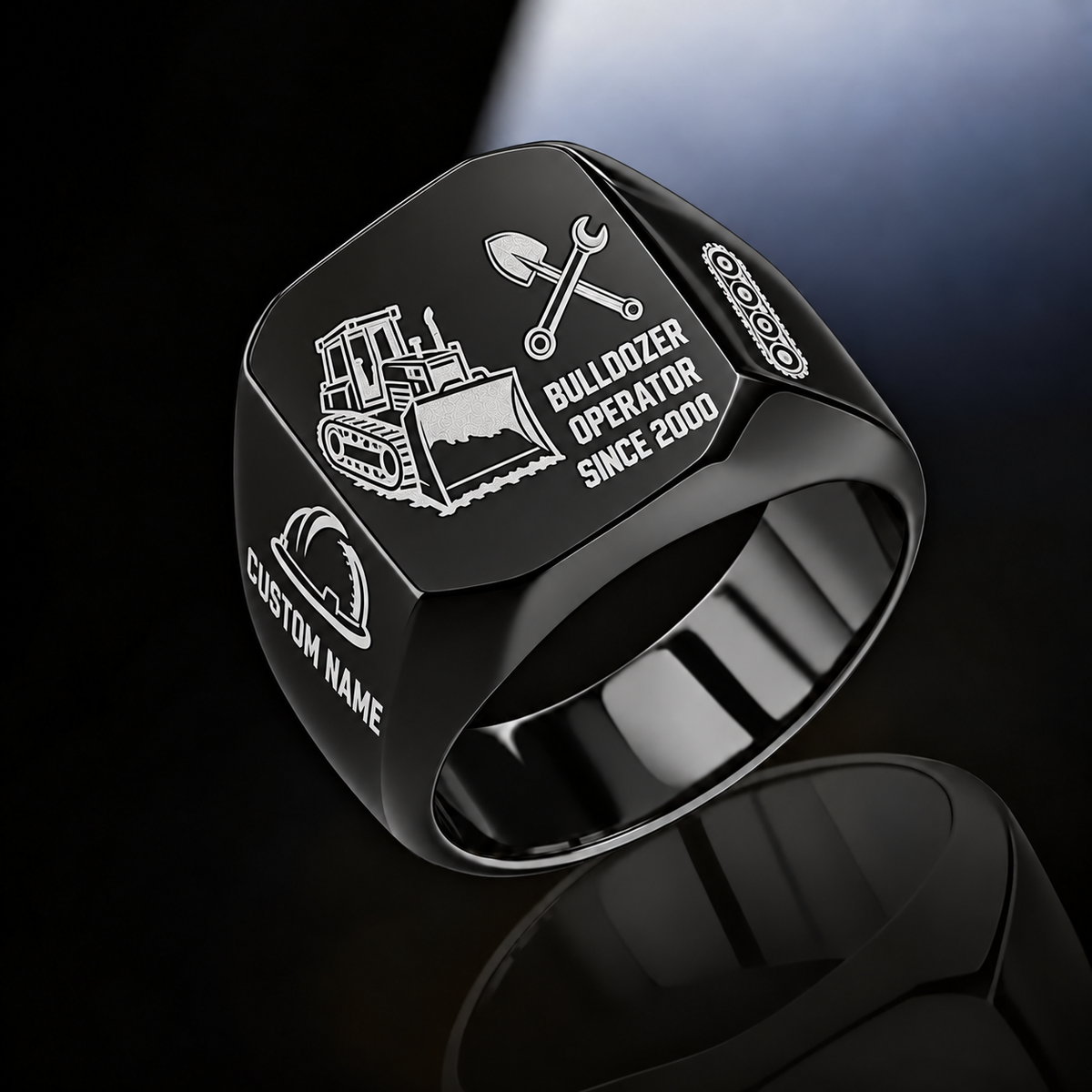 Black Bulldozer Operator Split Emblem signet ring with a tracked bulldozer and pushing blade on the left, crossed shovel and wrench above occupation text on the right, hard-hat and track-chain shoulders, and sample CUSTOM NAME and SINCE 2000.