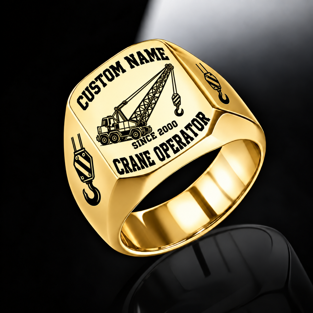 Gold-finish Crane Operator Bold Lettering signet ring with lattice-boom crane and shoulder hoist-hook artwork, with illustrated CUSTOM NAME and SINCE 2000 text