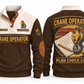 Crane Operator Plan Check Lift Sports Sweatshirt in Brown, front and back, with a vintage crane pulley hook, wire-rope sling and shackle over a plan-sheet sunset roundel, CRANE OPERATOR and PLAN CHECK LIFT lettering, and sample YOUR NAME and SINCE 2000 text.
