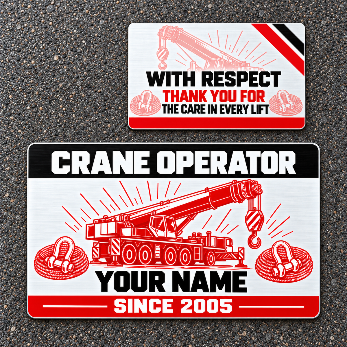 Front and reverse of the Crane Operator Red Monochrome aluminum wallet card on a dark textured tabletop, with red mobile-crane boom and hook artwork, rigging rope coils and shackles, a black title band, and a pale-red appreciation reverse.