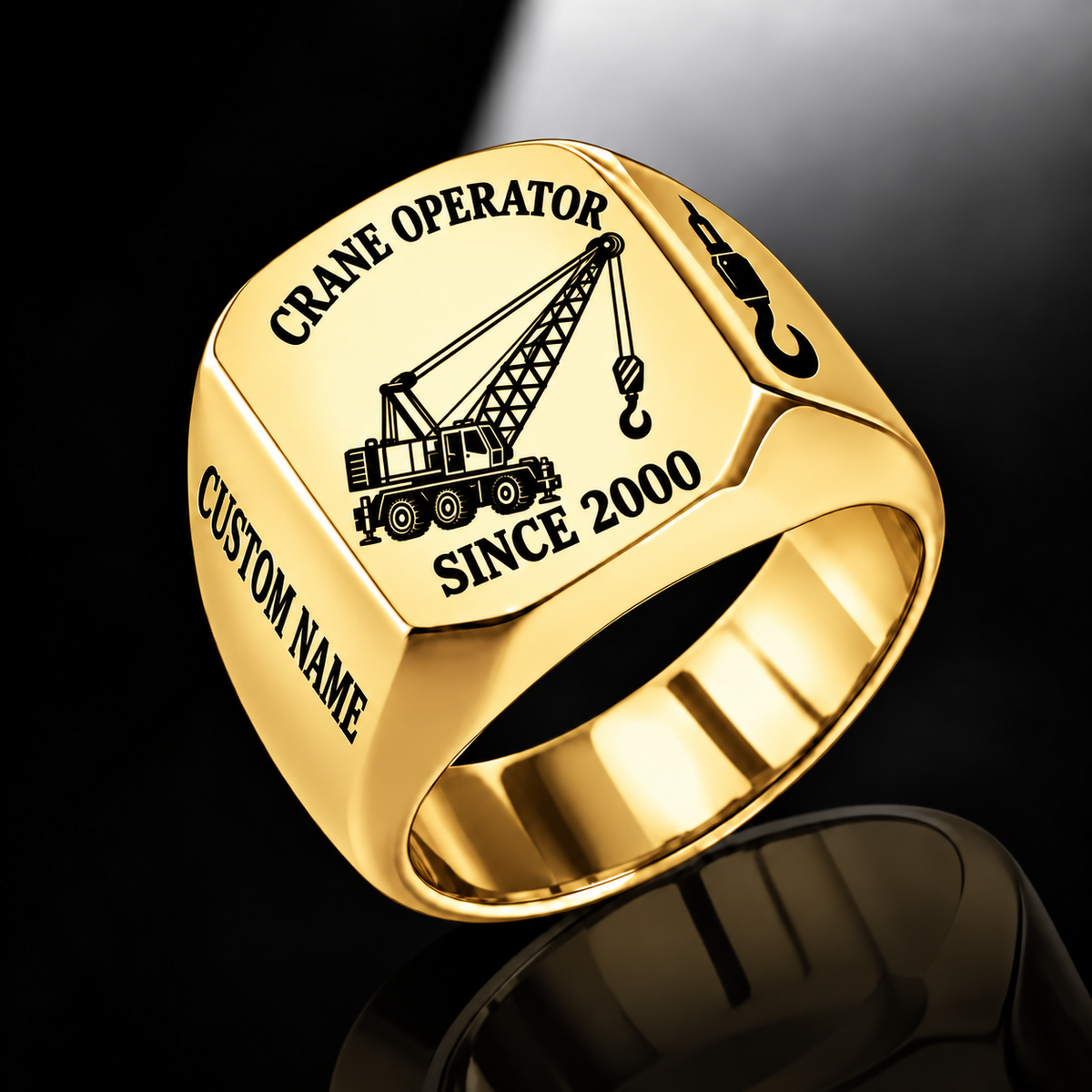Gold-finish Crane Operator Trade Emblem signet ring with lattice-boom crane, suspended hoist, shoulder hook and illustrated CUSTOM NAME and SINCE 2000 text