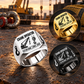 Crane Operator Twin Icons signet rings on a staged crane-rigging tabletop, with a dominant Silver finish and separate Gold and Black inset views