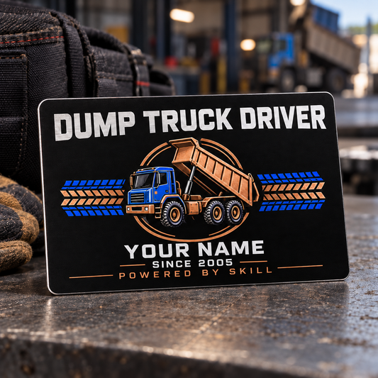 Midnight Pride dump truck driver aluminum wallet card standing on a grey dispatch bench, with black, blue and copper front artwork.