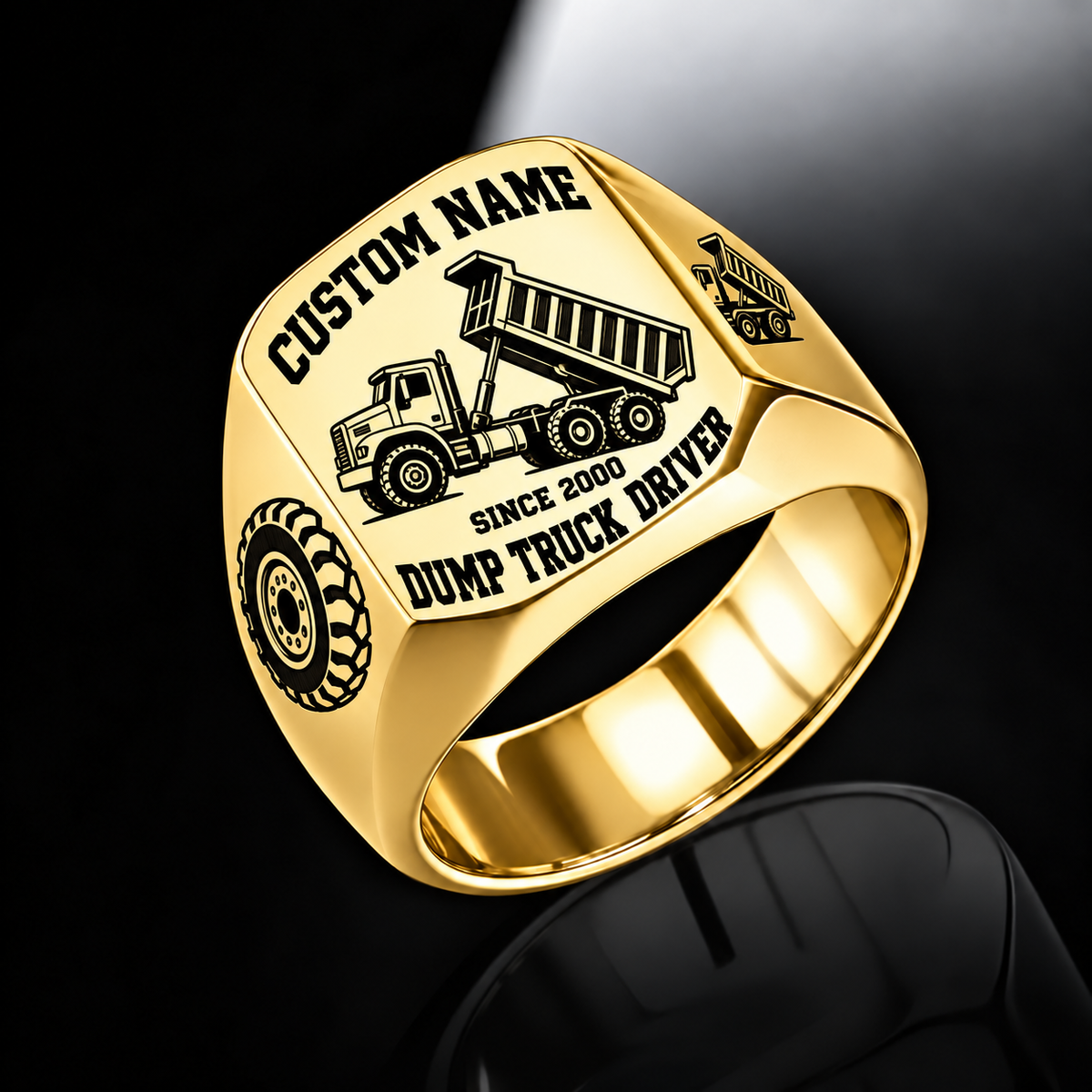 Dump Truck Driver Bold Lettering ring in Gold, showing CUSTOM NAME, SINCE 2000, raised-bed dump truck, wheel and matching shoulder emblem