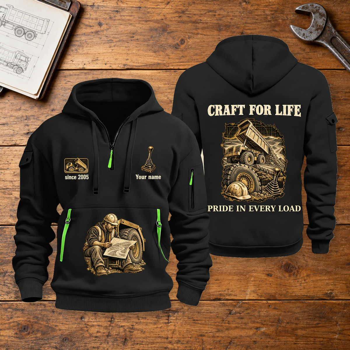 Dump Truck Driver Craft For Life Quarter-Zip Hoodie in Black, full authentic front and back views with matching dump truck driver tools and equipment artwork, original sample name/year and Craft For Life slogan. On a dump truck driver workbench.