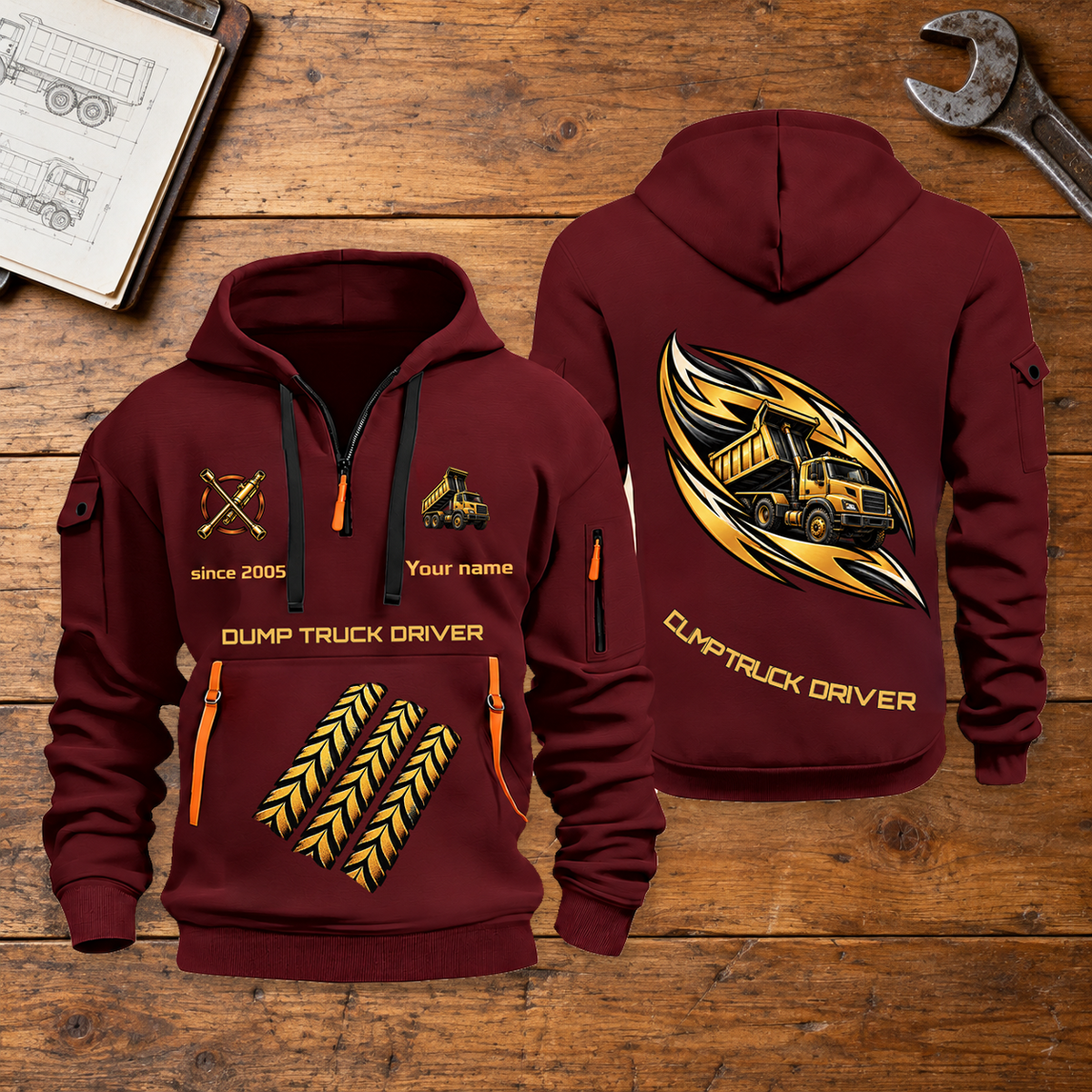 Dump Truck Driver Flow of Craft Quarter-Zip Hoodie in Wine Red, full authentic front and back views with matching dump truck driver tools and equipment artwork, original sample name/year and curved gold occupation lettering. On a dump truck driver workbench.