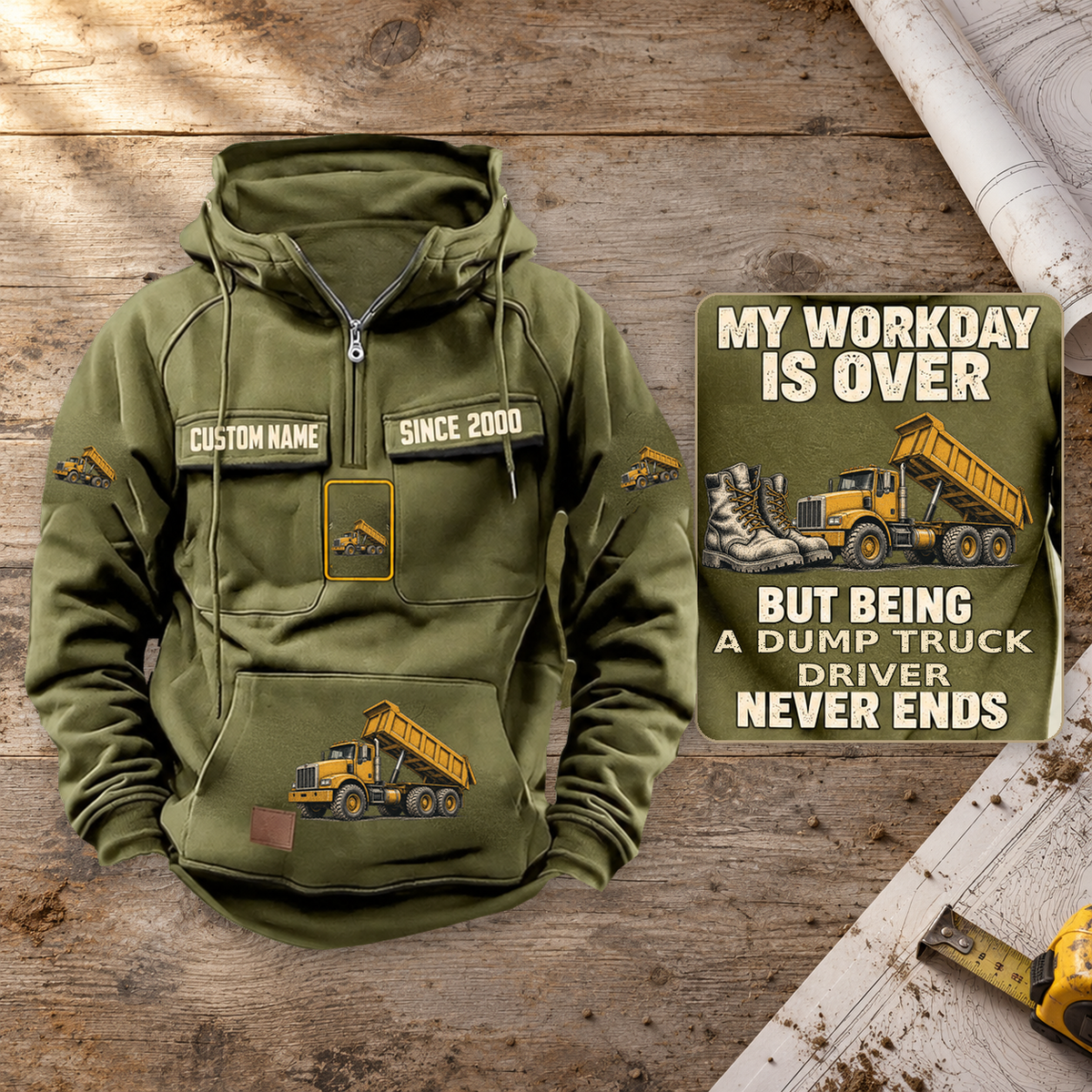Dump Truck Driver Never Ends Vintage Hoodie in Military Green on a warm planning workbench, dominant front view with a complete rear-art detail inset.