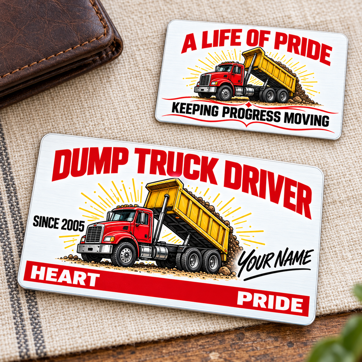 Dump Truck Driver Signature Classic Aluminum Wallet Card, showing the complete front and reverse in white, red, black, yellow with rigid tipping-body dump-truck artwork; two views of one fixed-artwork card.