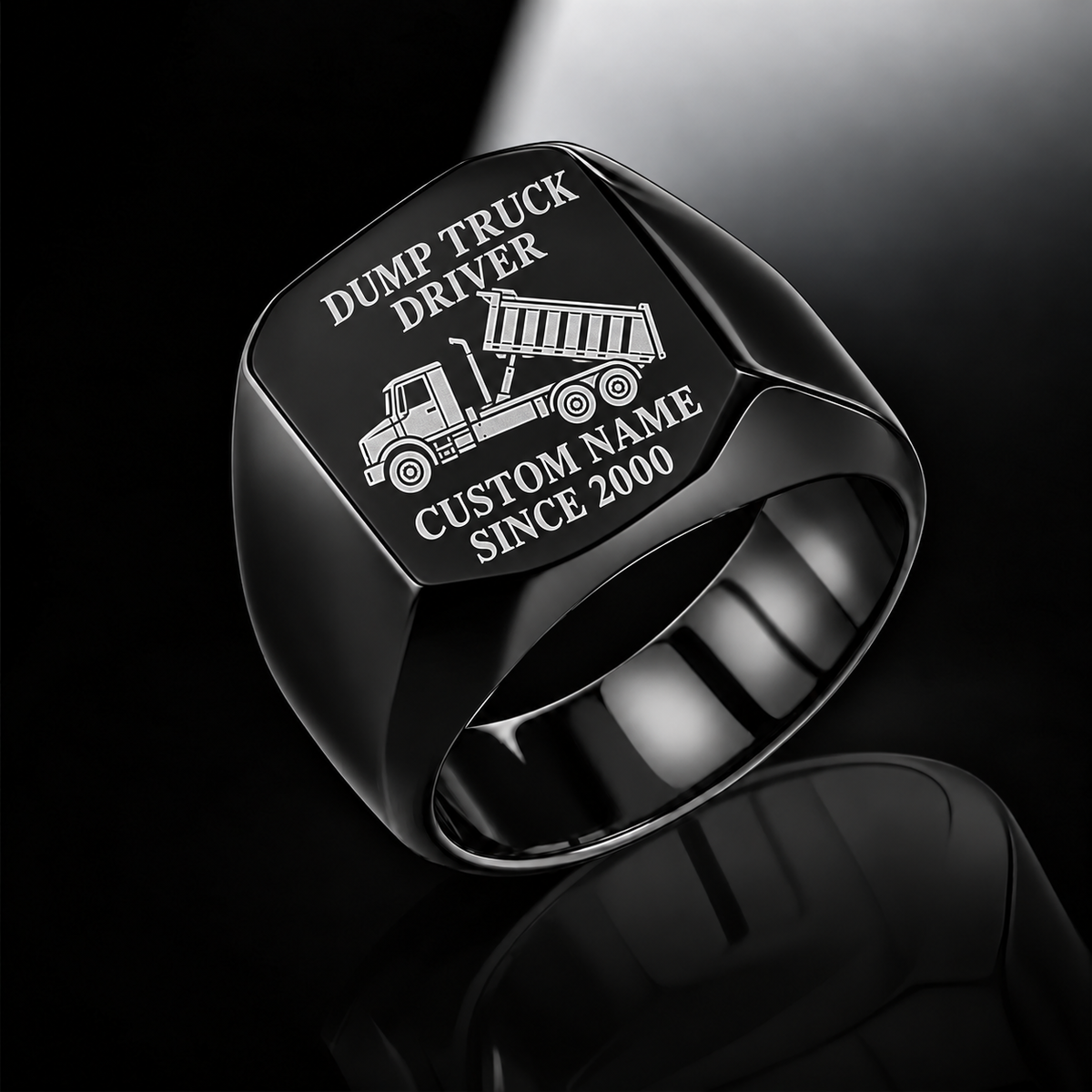 Black Dump Truck Driver Signature Crest ring with tipping dump-truck engraving, plain shoulders and sample CUSTOM NAME and SINCE 2000 text