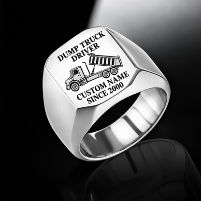 Silver Dump Truck Driver Signature Crest ring with tipping dump-truck engraving, plain shoulders and sample CUSTOM NAME and SINCE 2000 text