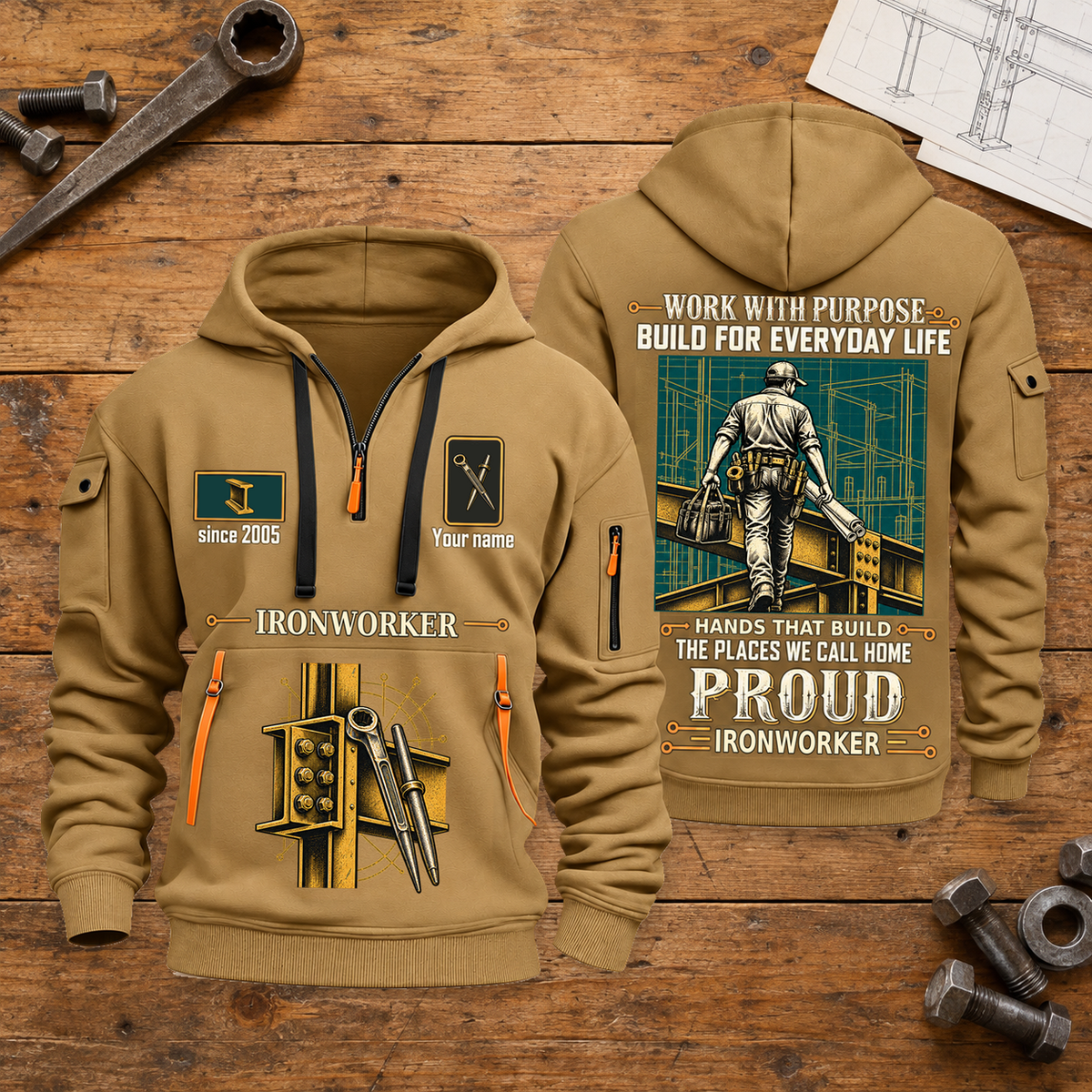 Ironworker Built For The Everyday Quarter-Zip Hoodie in Khaki, full authentic front and back views with matching ironworker tools and equipment artwork, original sample name/year and Built For The Everyday planning theme. On a ironworker workbench.