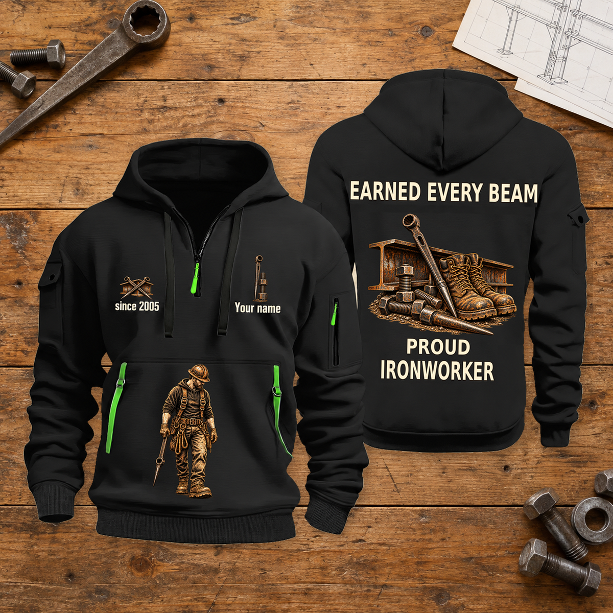 Ironworker Earned Every Beam Quarter-Zip Hoodie in Black, full authentic front and back views with matching ironworker tools and equipment artwork, original sample name/year and Earned Every slogan. On a ironworker workbench.