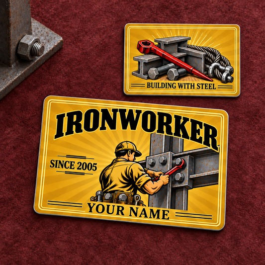 Front and reverse of an Ironworker Golden Milestone aluminum wallet card on burgundy suede, with golden sunbursts, black vintage lettering, a worker at a bolted steel joint and a red spud-wrench toolkit.