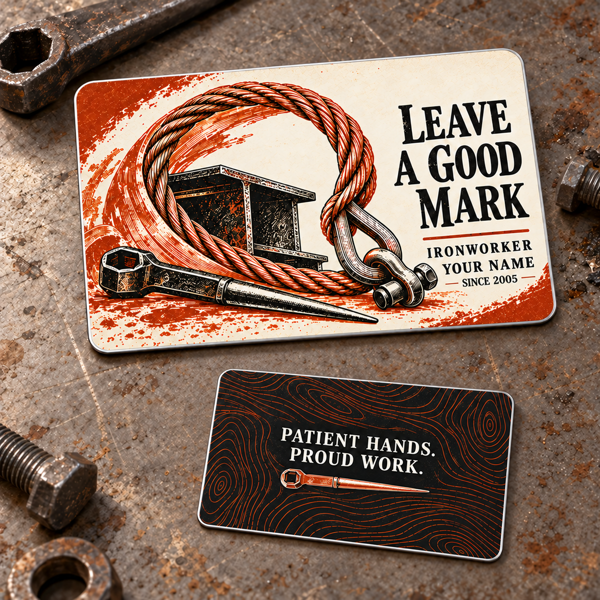 Ironworker Leave a Good Mark aluminum wallet card, with ivory rigging-sling, spud-wrench and steel-beam artwork and a black Patient Hands, Proud Work reverse.