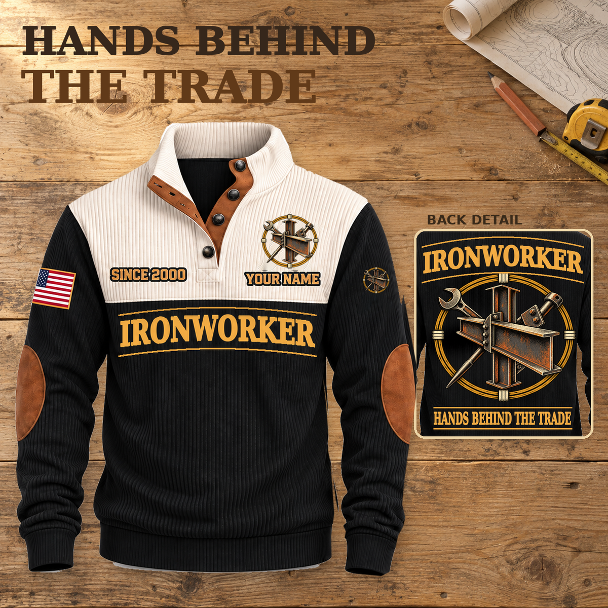 Ironworker Hands Behind the Trade Sports Sweatshirt in Black, dominant front view with supported back-print detail inset on a wooden workbench.