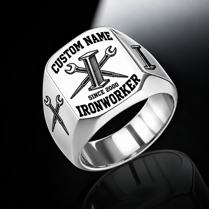 Silver Ironworker Bold Lettering Signet Ring with an I-beam, crossed spud-wrench engraving, matching shoulder motifs, and CUSTOM NAME and SINCE 2000 sample text.