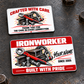 Front and reverse of an Ironworker Red Header aluminum wallet card on graphite steel, with red and white lettering, structural-steel tools and an appreciation message.