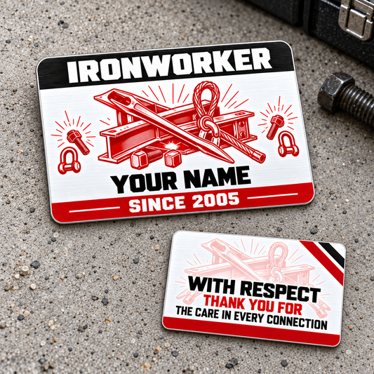 Front and reverse of an Ironworker Red Monochrome aluminum wallet card on gray concrete, with a white-on-black title, red beam and spud-wrench illustration, centered sample name, red year band and pale-red reverse artwork.