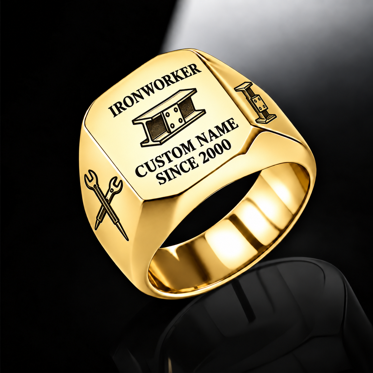 Gold-finish Ironworker Signature Crest signet ring with bolted I-beam and pointed spud-wrench engraving, and illustrated CUSTOM NAME and SINCE 2000 text