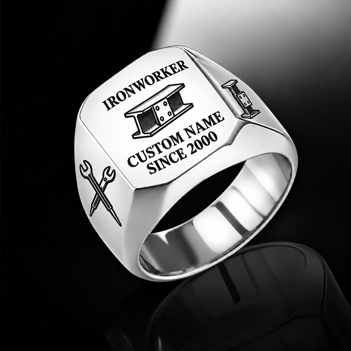 Silver-finish Ironworker Signature Crest signet ring with bolted I-beam and pointed spud-wrench engraving, and illustrated CUSTOM NAME and SINCE 2000 text