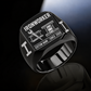 Black-finish Ironworker Twin Icons signet ring with spud-wrench and I-beam artwork beside a four-bolt splice-plate emblem, I-beam shoulders and illustrated CUSTOM NAME and SINCE 2000 text