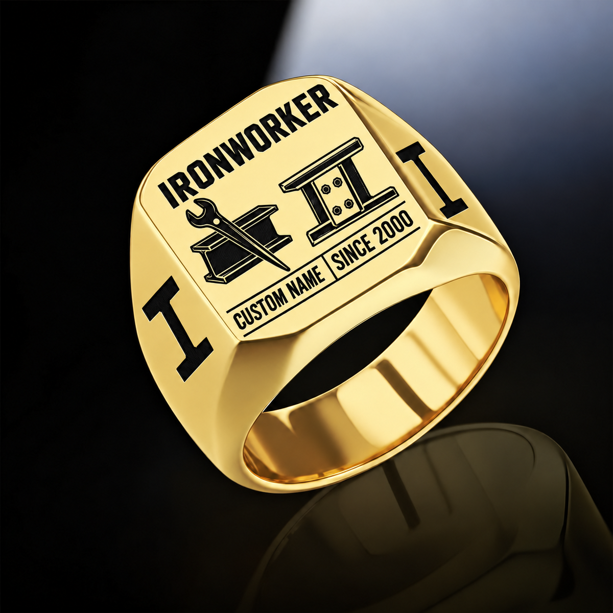 Gold-finish Ironworker Twin Icons signet ring with spud-wrench and I-beam artwork beside a four-bolt splice-plate emblem, I-beam shoulders and illustrated CUSTOM NAME and SINCE 2000 text