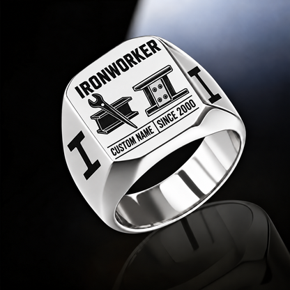 Silver-finish Ironworker Twin Icons signet ring with spud-wrench and I-beam artwork beside a four-bolt splice-plate emblem, I-beam shoulders and illustrated CUSTOM NAME and SINCE 2000 text