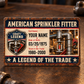 Sprinkler Fitter Craft Legend aluminum wallet card reverse with navy-and-cream identification-style artwork, connected fire-sprinkler piping, a pipe wrench and illustrative name, date and year text.