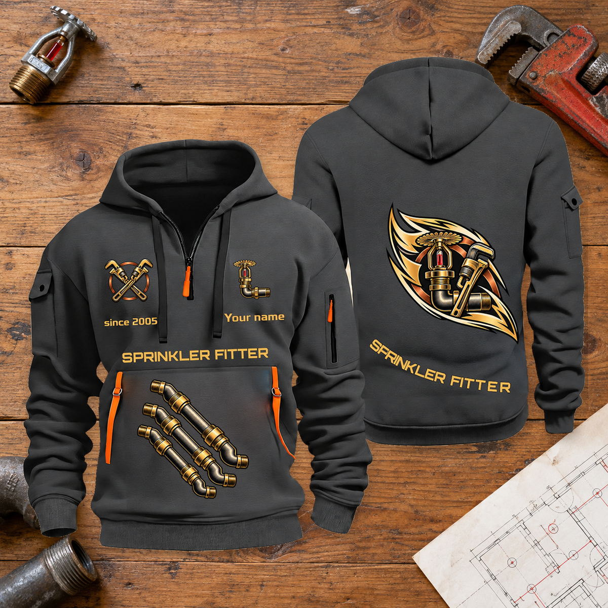 Sprinkler Fitter Flow of Craft Quarter-Zip Hoodie in Gray, full authentic front and back views with matching sprinkler fitter tools and equipment artwork, original sample name/year and curved gold occupation lettering. On a sprinkler fitter workbench.