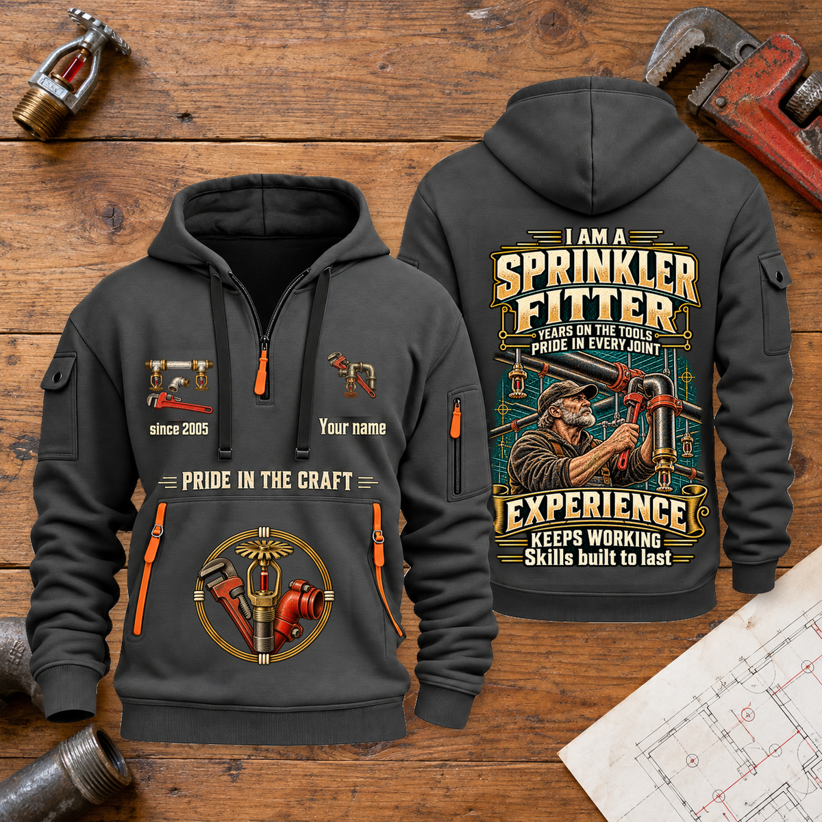 Sprinkler Fitter Experience Keeps Working Quarter-Zip Hoodie in Gray, full front and back views on a sprinkler fitter workbench.