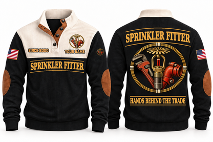 Sprinkler Fitter Hands Behind the Trade Sports Sweatshirt in Black, front and back with fire sprinkler head, pipe wrench and grooved pipe fitting, plus illustrative sample name and year.