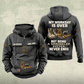 Sprinkler Fitter Never Ends Vintage Hoodie in Dark Gray, front and back, with work boots and a fire sprinkler head, pipe fittings and a pipe wrench, matching sleeve, chest and pocket motifs, and illustrative CUSTOM NAME and SINCE 2000 text.