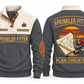 Sprinkler Fitter Plan Check Fit Sports Sweatshirt in Grey, original front and back views. A fire sprinkler head, steel pipe fittings and a pipe wrench over a plan sheet and pencil within a distressed sunset roundel. SPRINKLER FITTER and PLAN CHECK FIT lettering; YOUR NAME and SINCE 2000 are fixed illustrative sample text.