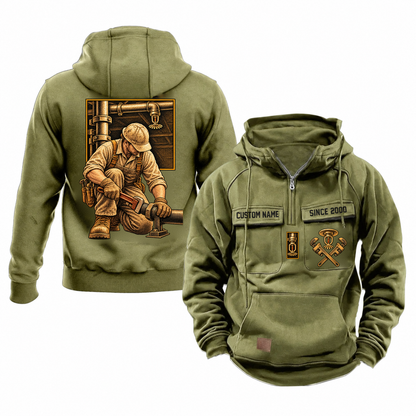 Sprinkler Fitter Ready Every Day Portrait Vintage Hoodie in Military Green, front and back views with a kneeling trade portrait, square scene panel and coordinated chest emblems; illustrative CUSTOM NAME and SINCE 2000 samples.