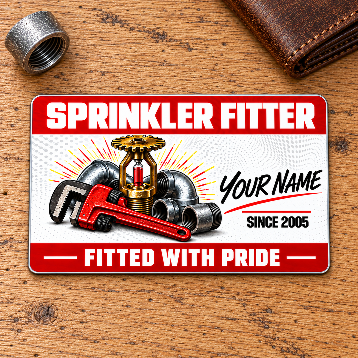 Sprinkler Fitter Red Header Aluminum Wallet Card, complete front with red header/footer bands, white dotted-wave print, flowing name lettering and pipe-wrench, steel fitting and fire-sprinkler artwork; fixed artwork as shown.