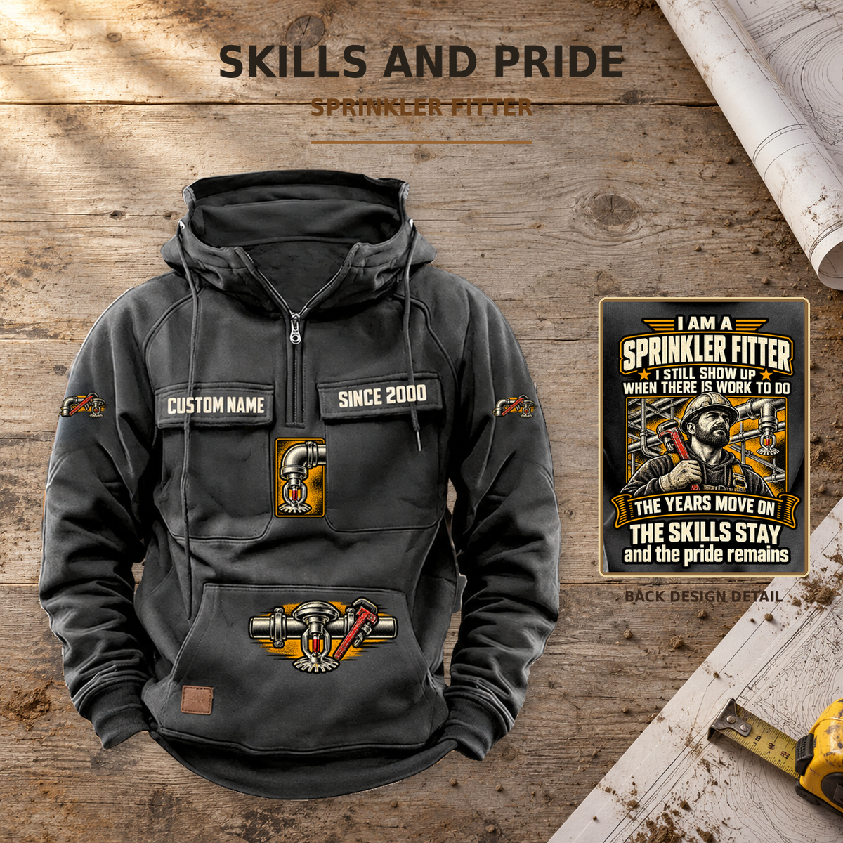 Sprinkler Fitter Skills and Pride Vintage Hoodie in Dark Gray, complete front view on a warm planning workbench, with a separate close-up of the actual back artwork, coordinated trade artwork and illustrative CUSTOM NAME and SINCE 2000 samples.