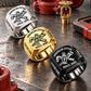 Sprinkler Fitter Trade Emblem signet rings in a Black-led diagonal arrangement with Silver and Gold on a stationary sprinkler-fitting workbench, with tools at rest