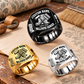 Wallpaper Hanger Bold Lettering rings: Black ring at the upper triangular apex with Gold and Silver rings below on a stationary wallpaper worktable