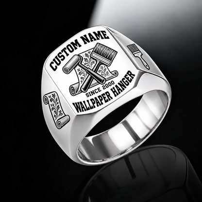 Silver-finish Wallpaper Hanger Bold Lettering signet ring with patterned wallpaper-scroll, roller and pasting-brush engraving, and illustrated CUSTOM NAME and SINCE 2000 text