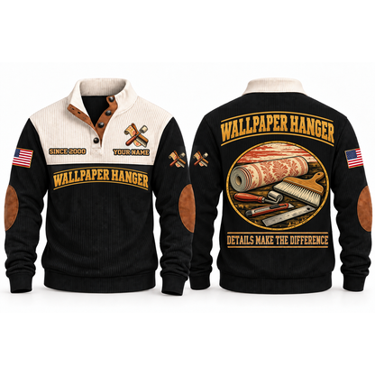 Wallpaper Hanger Finish With Care Sports Sweatshirt in Black, front and back garment views with wallpaper roll, smoothing brush, seam roller, trimming knife and ruler, carefully arranged trade details, DETAILS MAKE THE DIFFERENCE lettering and source sample YOUR NAME and SINCE 2000 text.