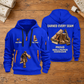 Wallpaper Hanger Earned Every Seam Quarter-Zip Hoodie in Blue, full authentic front and back views with matching wallpaper hanger tools and equipment artwork, original sample name/year and Earned Every slogan. On a wallpaper hanger workbench.