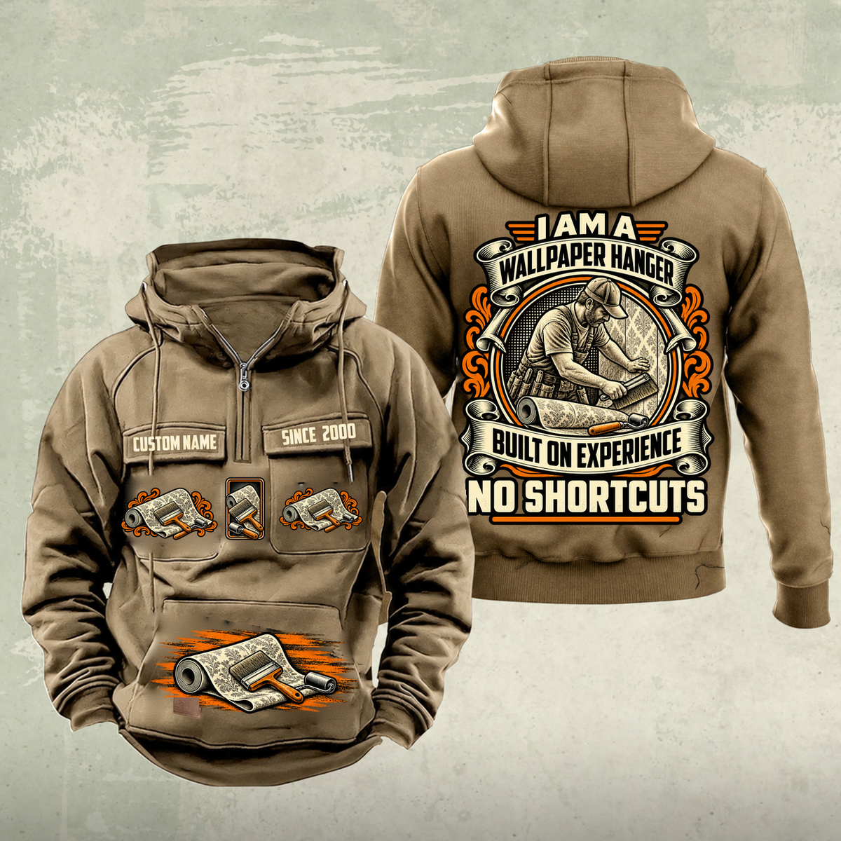 Wallpaper Hanger Heritage Crest Vintage Hoodie in Kaki, source-faithful front and back views with an ornate trade portrait crest, matching chest and pouch badges, and illustrative CUSTOM NAME and SINCE 2000 samples.