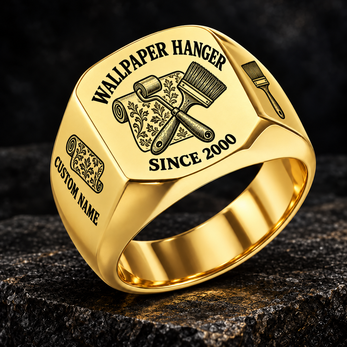 Gold-finish Wallpaper Hanger Heritage Emblem signet ring with patterned wallpaper-roll, seam-roller and pasting-brush engraving, and illustrated CUSTOM NAME and SINCE 2000 text